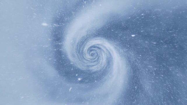 Slow motion aerial tracking zoom of swirling snow vortex spiraling over icy ocean surface in polar atmosphere