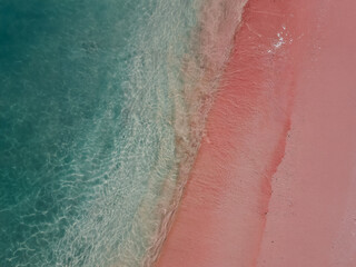Fototapeta premium Pink Beach Crystal Clear Turquoise Water and Unique Pink Sand in Komodo National Park