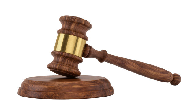 Wooden gavel and sound block on a surface