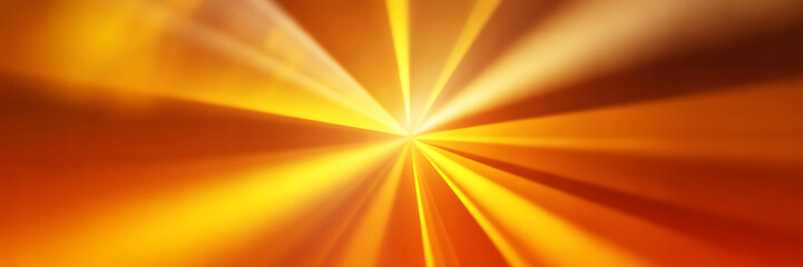 Obraz premium Vibrant orange and yellow light rays emanating from a central point creating a dynamic abstract background with bright beams