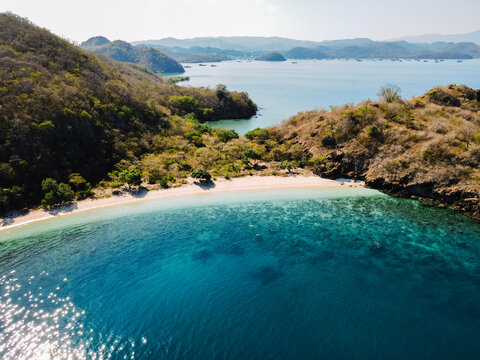 Breathtaking Landscape of Komodo National Park with Volcanic Hills and Blue Bays