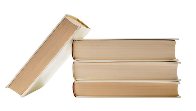 Stacked beige hardcover books with one leaning at angle