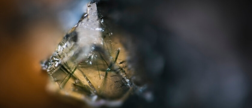 Macro image of prase green translucent quartz with actinolite needle inclusions from Sinyaya Rechka, Primorye, via microscope, 10x magnification, 3.6mm field of view