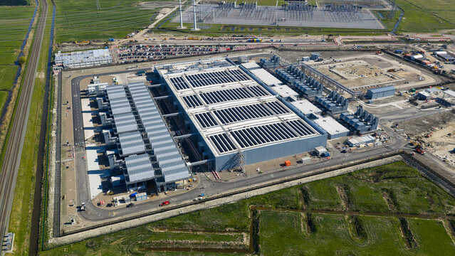 Drone view of hyperscale datacenter in Westpoort, Groningen, featuring big data, AI infrastructure, machine learning, cloud services, and sustainable digital development.