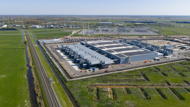 Drone view of hyperscale datacenter in Westpoort, Groningen, featuring big data, AI infrastructure, machine learning, cloud services, and sustainable digital development.