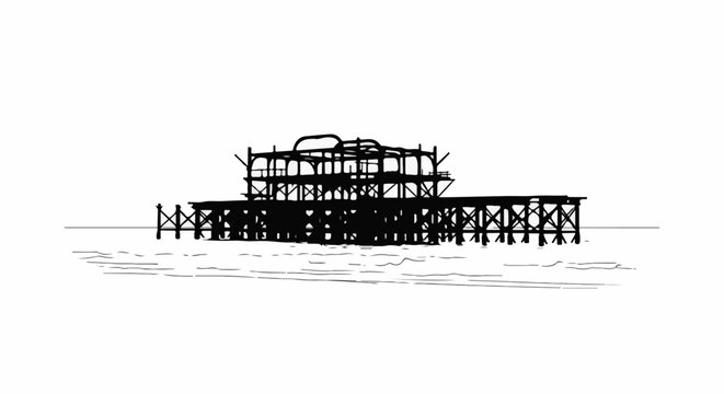 Black silhouette of a decaying pier structure on the ocean under a white sky