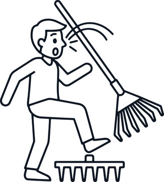 Man stepping on rake cartoon for fall and pain symbol.