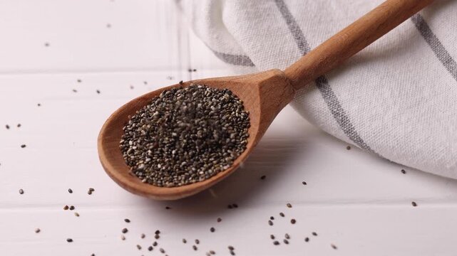 chia seeds on a light background. Useful supplements, super food, healthy food, veggie