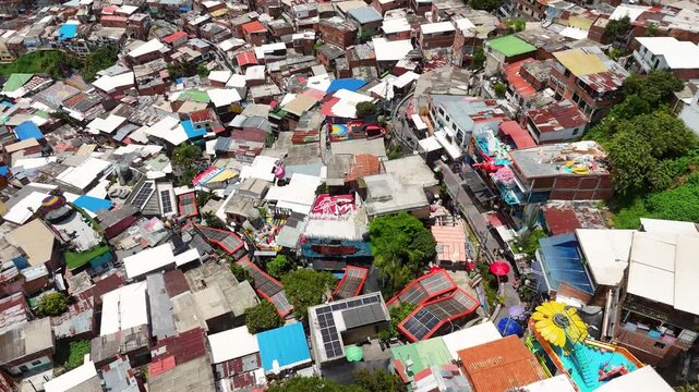 Aerial Drone Footage of Medell&iacute;n Cable Car System &ndash; Comuna 13 Urban Landscape and Mountain City