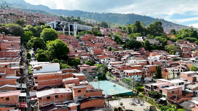 Aerial Drone Footage of Medell&iacute;n Cable Car System &ndash; Comuna 13 Urban Landscape and Mountain City