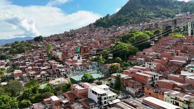 Cinematic Drone Footage of Comuna 13 Medell&iacute;n &ndash; Urban Transformation, Cable Cars, Escalator and City Life