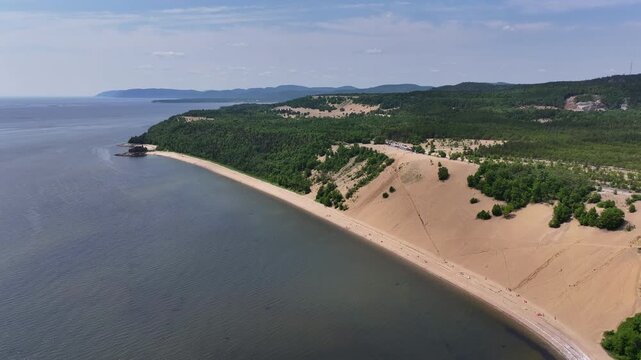 Long slow right pan of Tadousac's sand dunes - Quebec - Canada