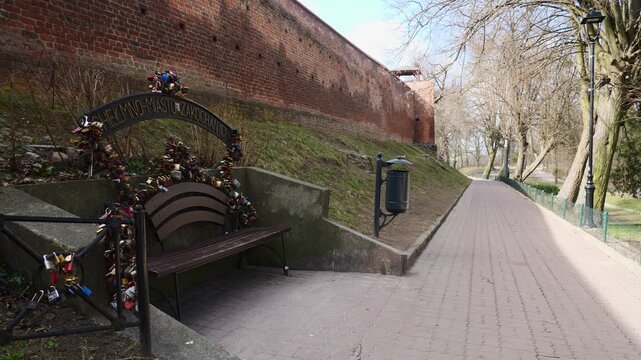 Bench with love locks in Chelmno, Poland