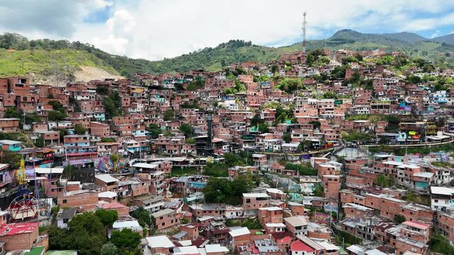 Cinematic Drone Footage of Comuna 13 Medell&iacute;n &ndash; Urban Transformation, Cable Cars, Escalator and City Life