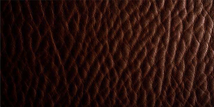 Macro closeup of natural brown fur and rough leather texture background with a vintage dark skin pattern for fashion design wallpaper