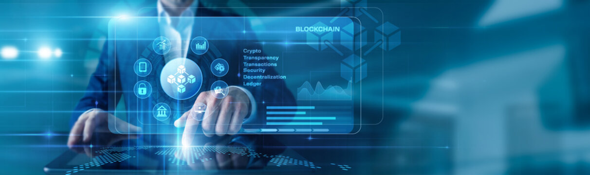 Blockchain Developer touching the tablet using Blockchain, displayed diagrams and graphs with icons of decentralization, ledger, crypto transactions, security across the world map.
