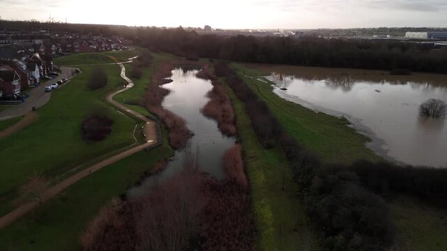 Aerial Sunset View of Winding Flooded River in Barton Seagrave Northamptonshire England