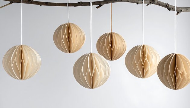 A branch with six hanging wooden decorative objects