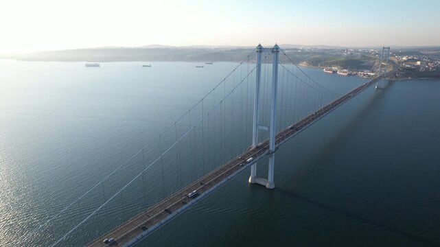 Osmangazi Bridge in Kocaeli, Turkey. Aerial shot with drone. Beautiful sunset landscape.