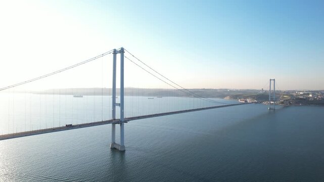 Osmangazi Bridge in Kocaeli, Turkey. Aerial shot with drone. Beautiful sunset landscape.