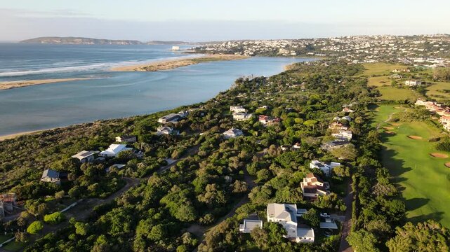 Sunrise aerial view over Goose Valley golf course and Keurbooms estuary in Plett