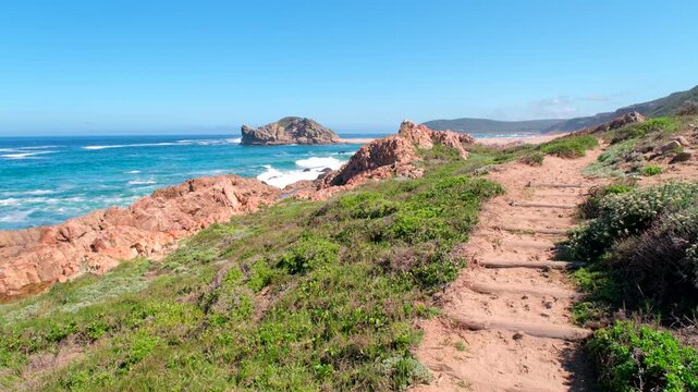 Sandy trail along Robberg Nature Reserve and Marine Protected Area circular hiking trail in Plettenberg Bay, South Africa