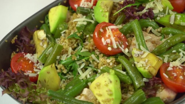 Hearty Quinoa And Green Bean Salad With Avocado And Cherry Tomato, Grated Parmesan, Tender Beans And Fluffy