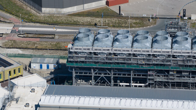 Drone view of Holland Hydrogen I on Tweede Maasvlakte, a major green hydrogen plant powered by offshore wind for sustainable industry and freight transport.