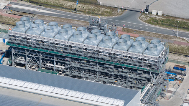Drone view of Holland Hydrogen I on Tweede Maasvlakte, a major green hydrogen plant powered by offshore wind for sustainable industry and freight transport.