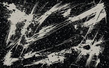 Obraz premium A grungy black background with white scratches and splatters everywhere