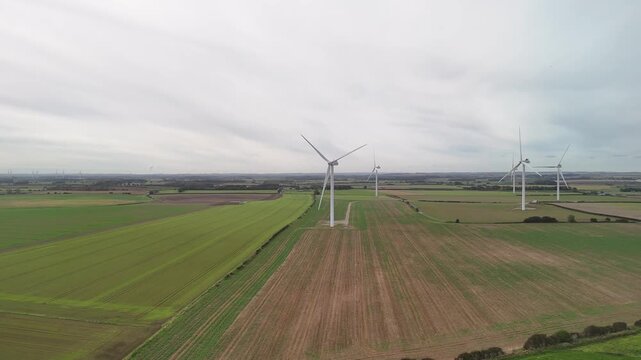 Aerial Drone View of Wind Turbines Across Green Farmland Near Bridlington Yorkshire
