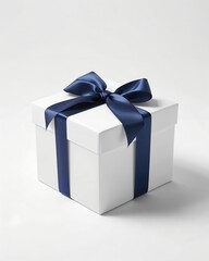 Fototapeta premium A beautifully wrapped gift box with a navy blue ribbon. Perfect for any occasion, conveys a sense of anticipation and thoughtfulness