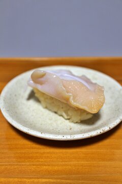 Tsubugai (whelk) Edomae nigirizushi made with red vinegar purchased at a supermarket in Tokyo, Japan