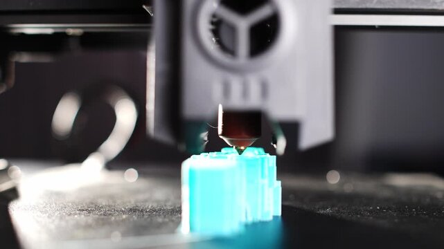 3D printing technology automatically creates a prototype on a printer. High quality 4k footage