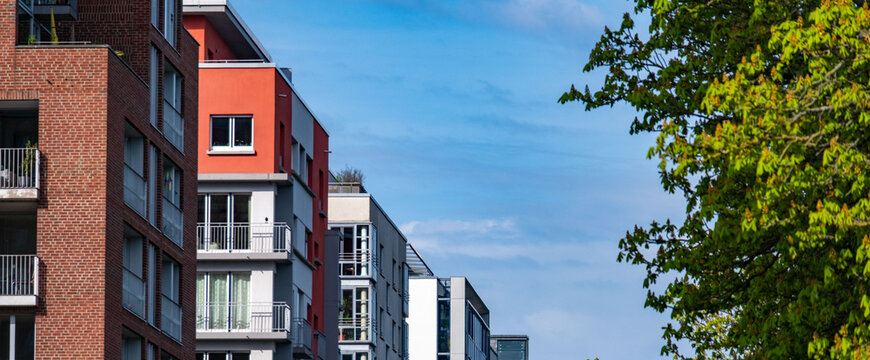 fragments modern multi-storey residential buildings European city, high-rise apartments, urban architecture, Contemporary residential design integrates private outdoor space, high-density environments