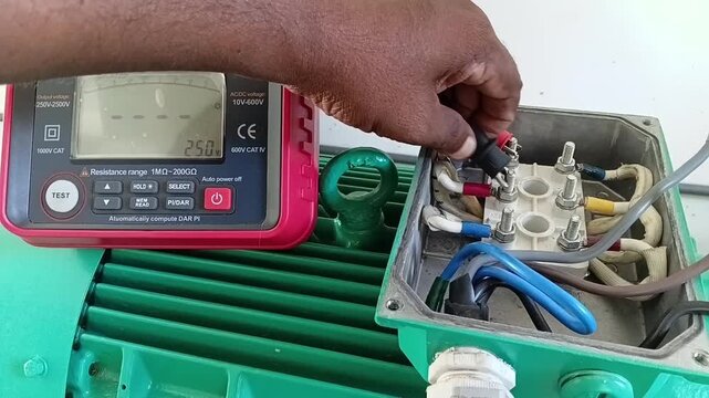 Motor Testing Sequence: Measuring Insulation Resistance Between U and V Phase Windings Using Digital Megger Tester
