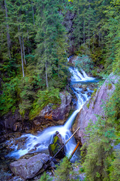 A mountain waterfall surrounded by forest. Tatra Mountains, Mickiewicz Falls.