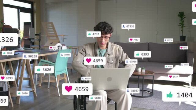Man in chair typing laptop in home causing floating likes growing near him showing social buzz
