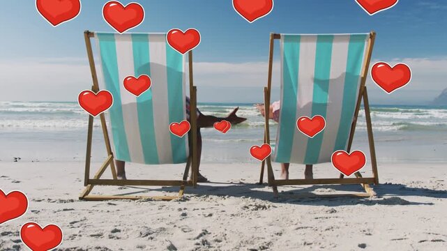 Couple on striped beach chairs, left reaching hand, animated hearts over limbs, travel showing love