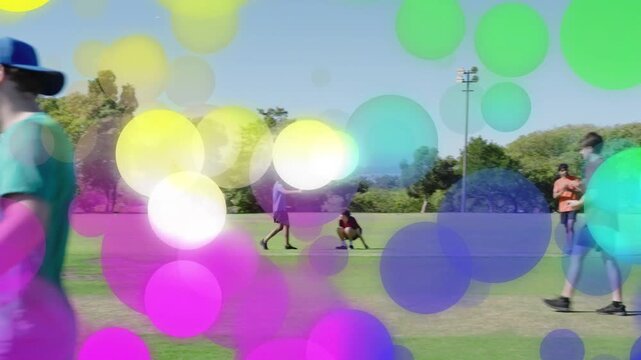 Cricket bowler bowling batsman hitting batsmen running to score color overlays drifting over play