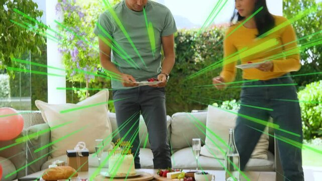 Man leaning forward to reach cake, couple serving food, resuming party, green rays crossing couple