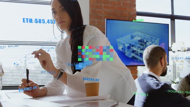 Mature woman leaning over papers writing and glancing while finance HUD appearing for crypto review