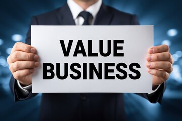 Obraz premium Man Holding a Sign Promoting the Concept of Value Business