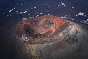 Aerial view of Okmok Volcano caldera with crater lake and glacial snow, Umnak Island, Alaska © Mariana Ianovska