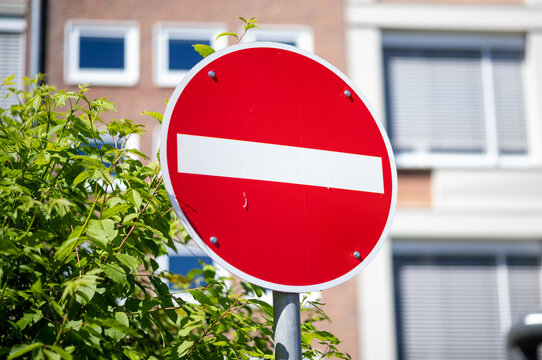 No entry red sign warning traffic restriction