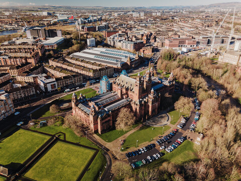 Glasgow Scotland: 13th Feb 2026: Drone view of Kelvingrove Art Gallery and Museum. Nearby buildings and streets are visible along with parked cars and green spaces