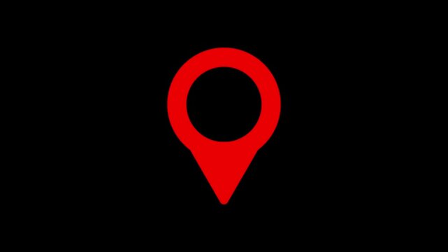 A simple red location pin icon isolated on a stark black background