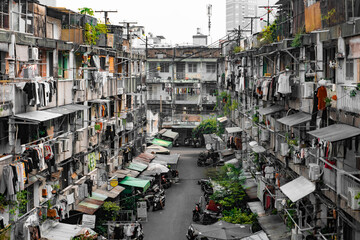 Daily life in an old residential apartment block with hanging laundry in Ho Chi Minh City, Vietnam © Gabriel