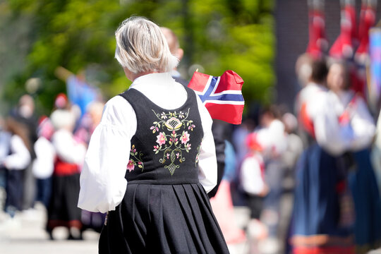 Norwegian Woman Black Bunad Floral Embroidery Back View Flag &mdash; May 17 Constitution Day Traditional Costume Norwegian Culture Kongsberg