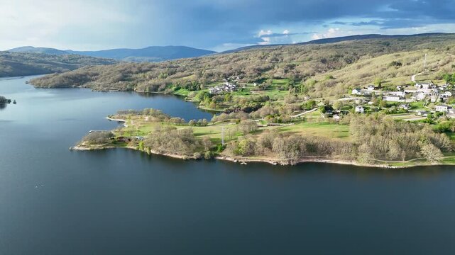 Aerial view of encoro de prada reservoir and surrounding landscape